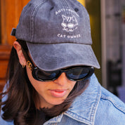 Zwarte denim pet - Logo "Anti-Social Cat Owner" 
