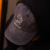 Zwarte denim pet - Logo "Dogs. Because People Suck" 