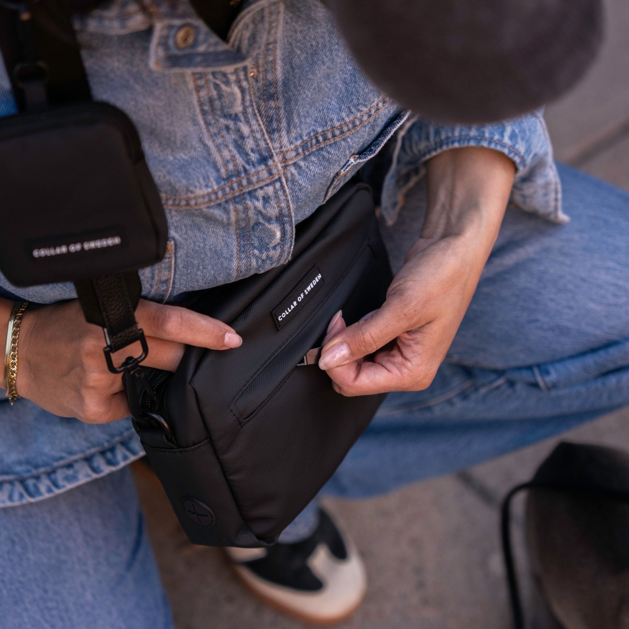 black-waterrepellent-crossbody-bag-detail-spring.jpg